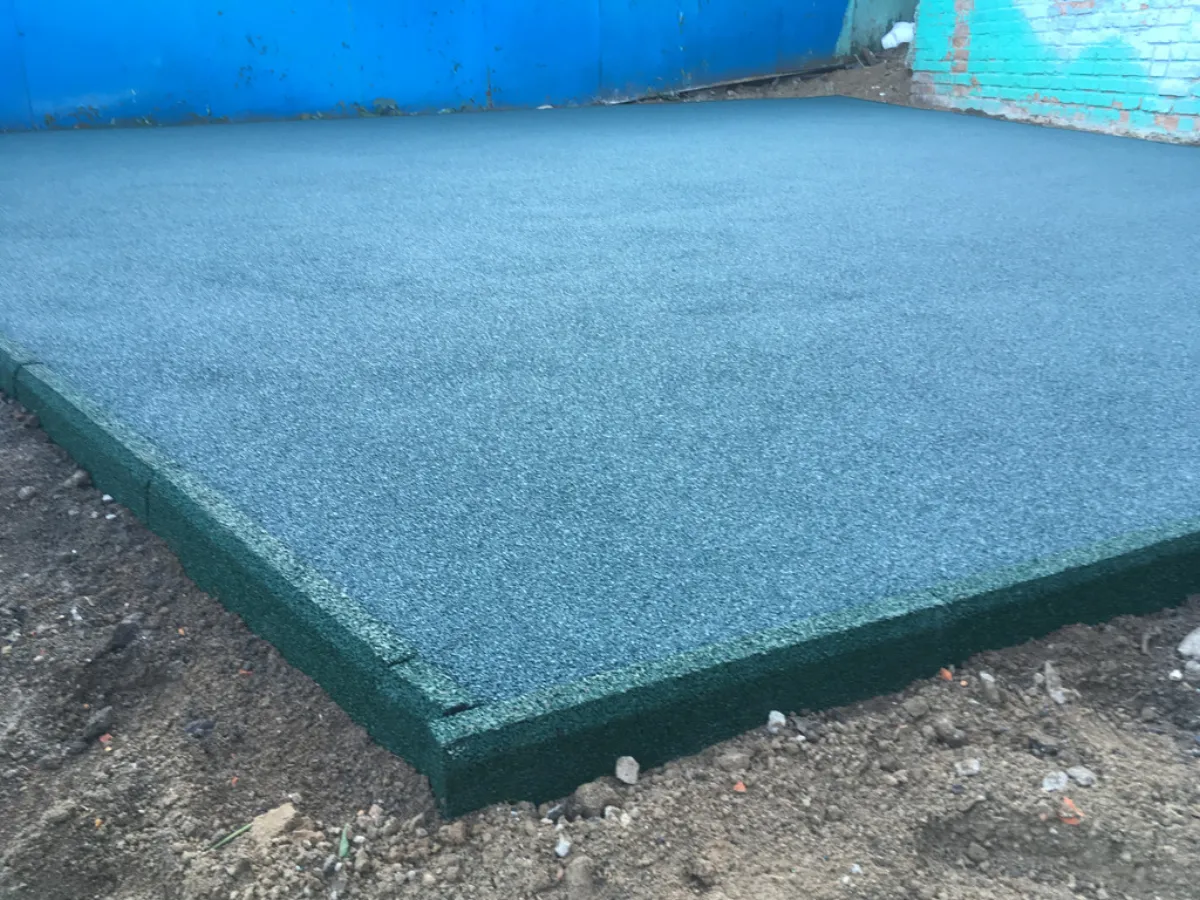 Two-layer playground surface